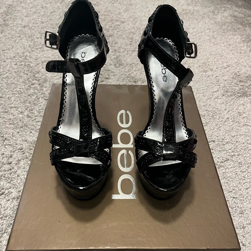 Black patent leather BEBE wedges size 6